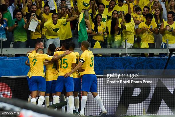 Philippe Coutinho of Brazil celebrates with teammates after scoring the opening goal during a match between Argentina and Brazil as part of FIFA 2018...