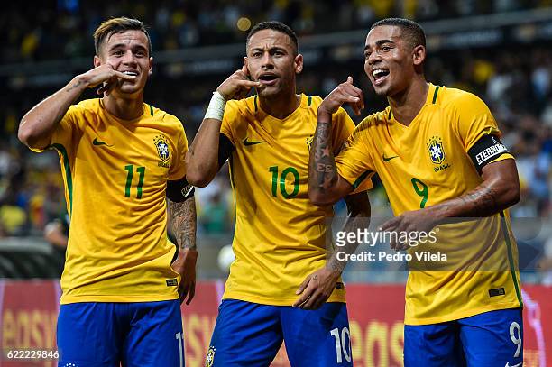 Philippe Coutinho, Neymar and Gabriel Jesus of Brazil celebrates a scored goal against Argentina during a match between Brazil and Argentina as part...
