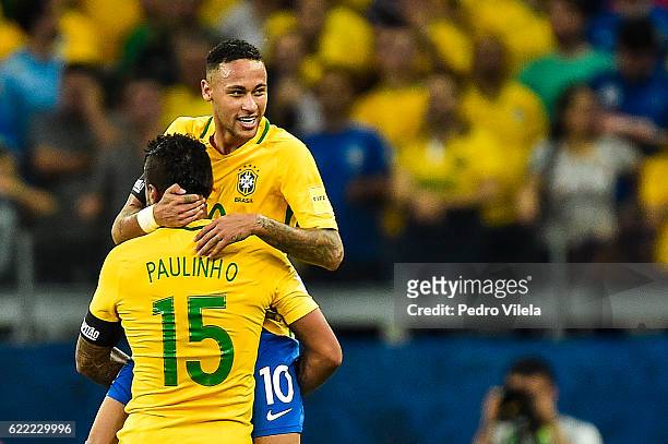 Paulinho and Neymar of Brazil celebrates a scored goal against Argentina during a match between Brazil and Argentina as part 2018 FIFA World Cup...