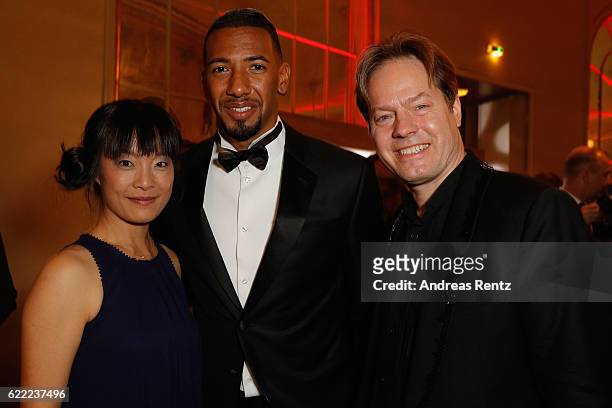Mira Wang, Jerome Boateng and Jan Vogler attend the GQ Men of the year Award 2016 after show party at Komische Oper on November 10, 2016 in Berlin,...
