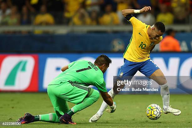 Neymar of Brazil struggles for the ball with goalkeeper Sergio Romero of Argentina during a match between Brazil and Argentina as part of 2018 FIFA...