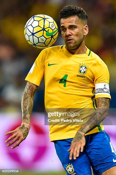 Dani Alves of Brazil controls the ball during a match between Brazil and Argentina as part 2018 FIFA World Cup Russia Qualifier at Mineirao stadium...