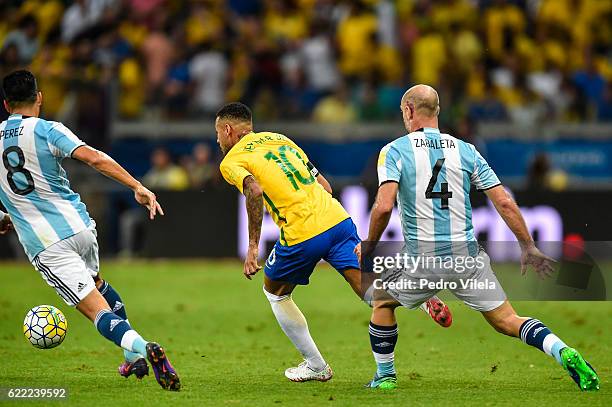 Neymar of Brazil and Zabaleta and Perez of Argentina battle for the ball during a match between Brazil and Argentina as part 2018 FIFA World Cup...