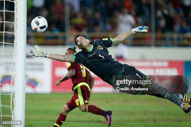 Carlos Lampe goalkeeper of Bolivia fails to stop Josef Martinez of Venezuela scoring the fourth goal of his team during a match between Venezuela...