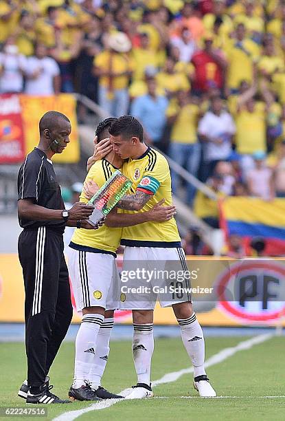 James Rodriguez of Colombia embraces his teammate Radamel Falcao during a match between Colombia and Chile as part of FIFA 2018 World Cup Qualifiers...