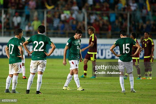 Players of Bolivia look dejected after loosing a match between Venezuela and Bolivia as part of FIFA 2018 World Cup Qualifiers at Monumental de...