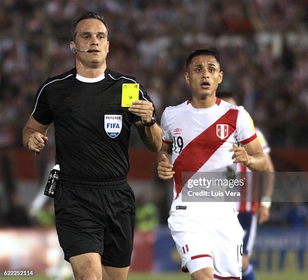 Referee Martin Lousteau shows a yelow card during a match between Paraguay and Peru as part of FIFA 2018 World Cup Qualifiers at Defensores del Chaco...