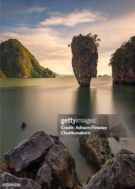 james bond island in phangnga bay at sunrise time - james bond island stock pictures, royalty-free photos & images