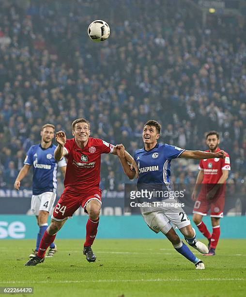 Gelsenkirchen, Germany , 1.Bundesliga 8. Spieltag, FC Schalke 04 - 1. FSV Mainz 05, v.l. Gaetan Bussmann FSV Mainz gegen Alessandro Schoepf Schalke