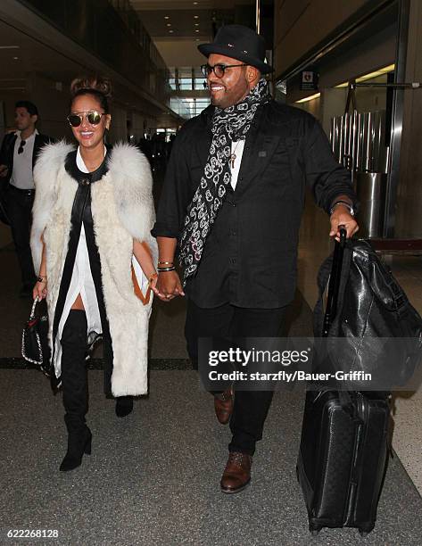 Adrienne Bailon is seen at LAX on November 09, 2016 in Los Angeles, California.