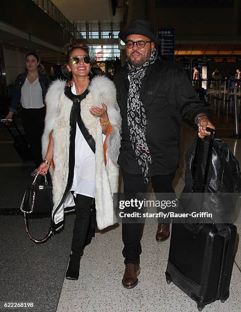 Adrienne Bailon is seen at LAX on November 09, 2016 in Los Angeles, California.