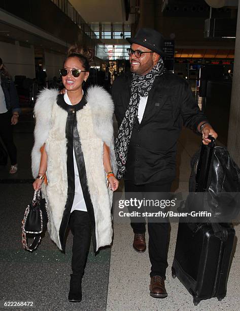 Adrienne Bailon is seen at LAX on November 09, 2016 in Los Angeles, California.