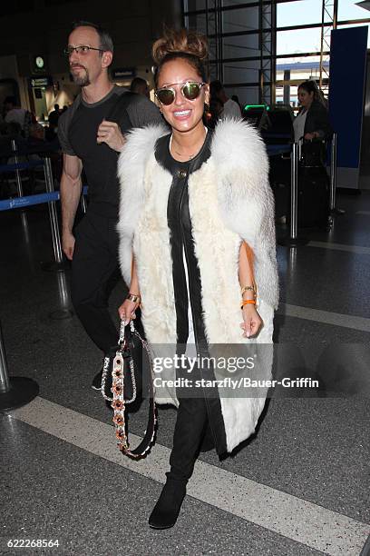 Adrienne Bailon is seen at LAX on November 09, 2016 in Los Angeles, California.
