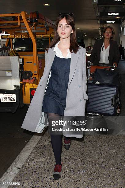 Felicity Jones is seen at LAX on November 09, 2016 in Los Angeles, California.