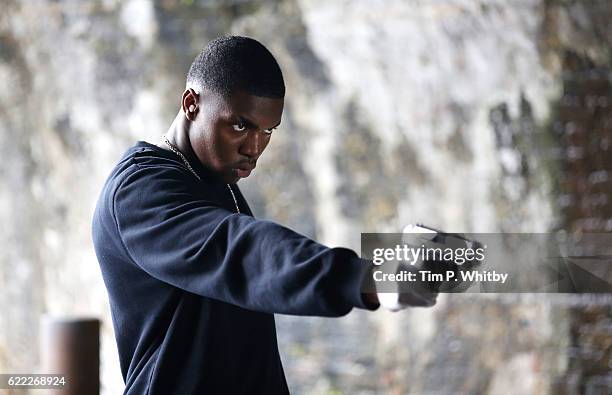 Actor Duayne Boachie on the set of 100 Streets in Battersea on September 1, 2014 in London, England.