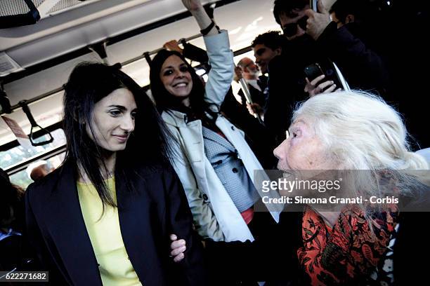 The mayor of Rome, Virginia Raggi speaks with an elderly woman on the bus during the presentation of the first 25 new buses for the supply of 150...