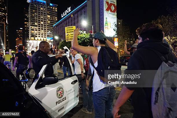 Protesters gather and block the roads of the downtown of L.A during a protest against President-elect Donald Trump of Republican Party in Los...