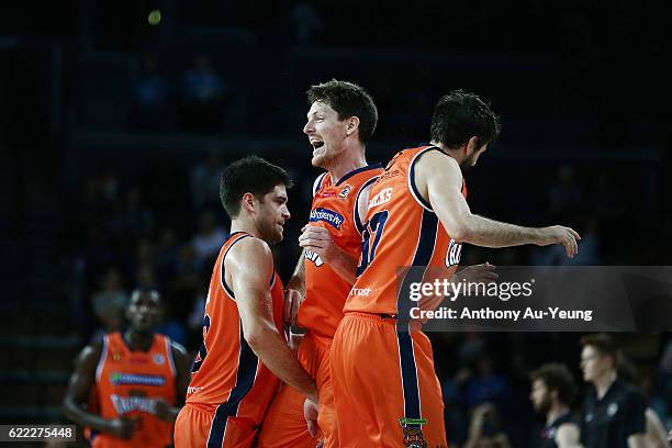 Cameron Gliddon of the Taipans celebrates with his team during the round six NBL match between the New Zealand Breakers and the Cairns Taipans at...