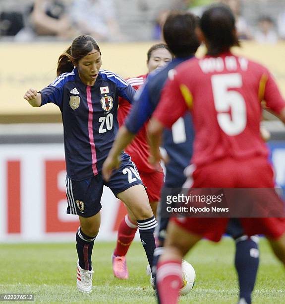 South Korea - INAC Kobe's Emi Nakajima of Japan scores a goal in the second half of the opening match against China of the Women's East Asian Cup in...