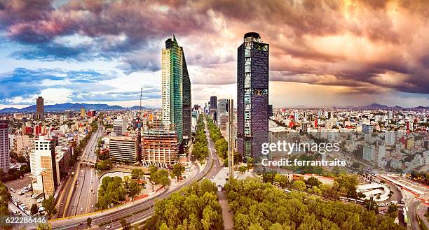 aerial view of mexico city skyline from chapultepec park - mexico city park stock pictures, royalty-free photos & images