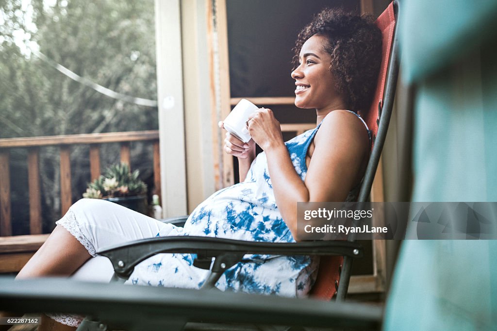 Pregnant Woman Relaxing With Tea