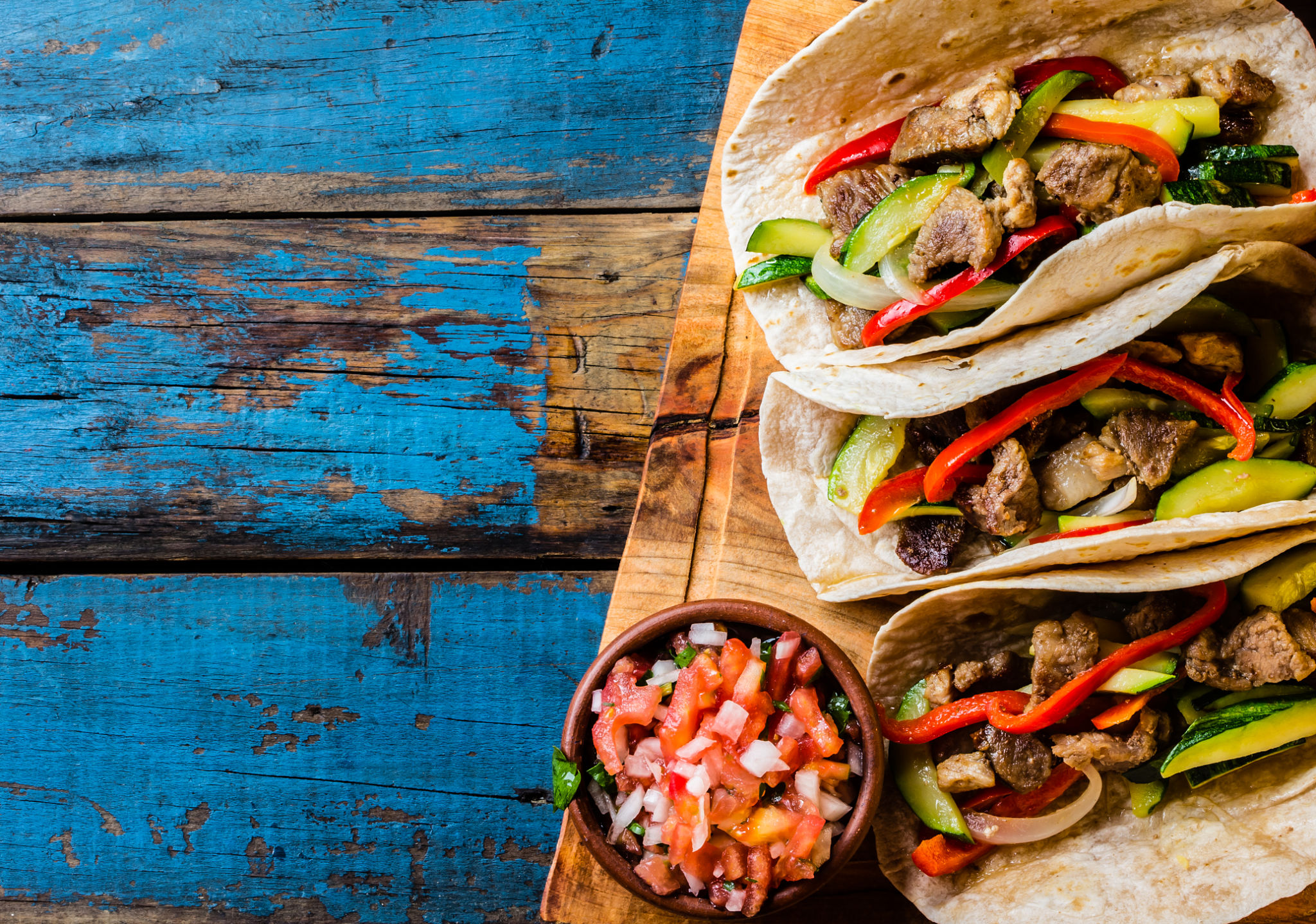 Mexican pork tacos with vegetables. Top view Mexican pork tacos with vegetables. Top view