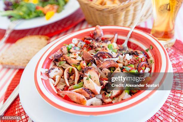 octopus salad, traditional portuguese cuisine - alentejo stockfoto's en -beelden