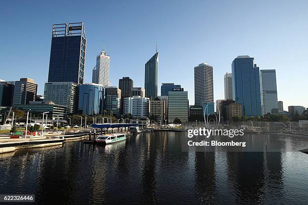 Commercial buildings stand in the central business district of Perth, Australia, on Friday, Oct. 28, 2016. Australian bonds tumbled, sending 10-year...
