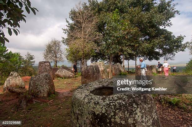 Tourists are visiting the Plain of Jars which consists of thousands of stone jars scattered around the upland valleys and the lower foothills of the...