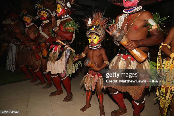 Local Papua New Guinea tribe members dance during a welcome reception at the Stanley Hotel ahead of the FIFA U-20 Women's World Cup Papua New Guinea...