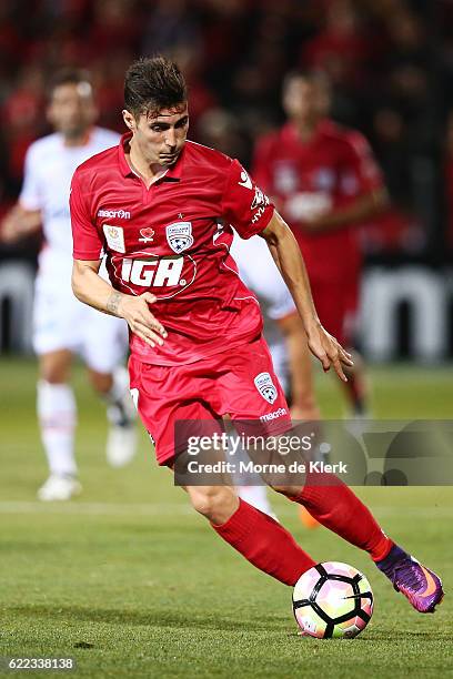 Sergio Guardiola of Adelaide United runs with the ball during the round six A-League match between Adelaide United and Brisbane Roar at Coopers...