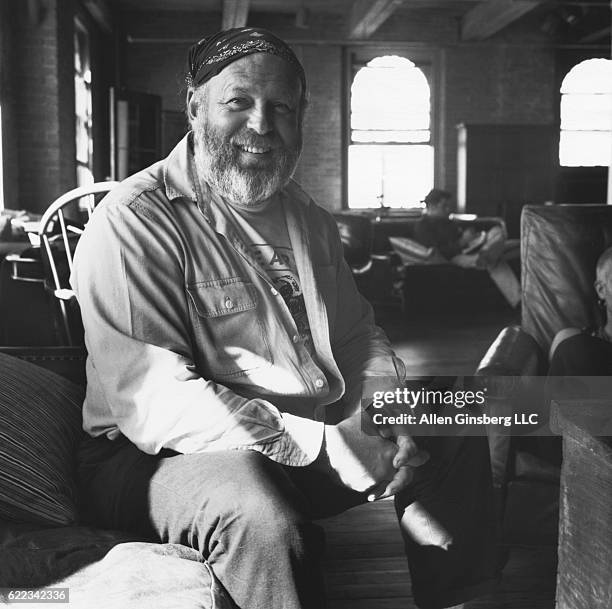 Photographer Bruce Weber Lounging on Couch