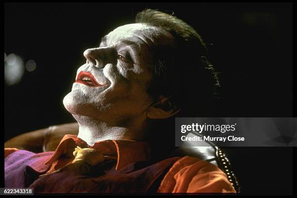 American actor Jack Nicholson plays the Joker in the movie Batman, directed by Tim Burton.