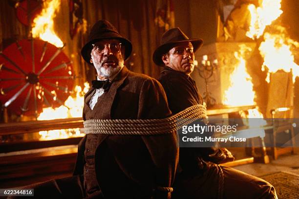 Actors Sean Connery and Harrison Ford on the set of the film Indiana Jones and the Last Crusade, directed by Steven Spielburg.