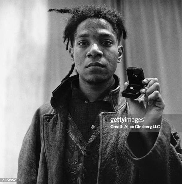 Artist Jean-Michel Basquiat Holding Engagement Ring