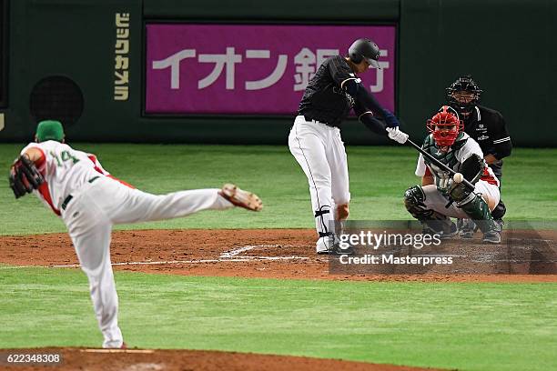 Designated hitter Shohei Ohtani of Japan flies out in the sixth inning during the international friendly match between Mexico and Japan at the Tokyo...