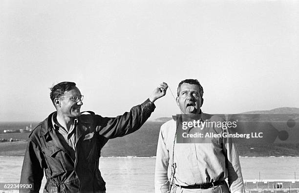 William Burroughs & Alan Ansen - Tangier Morocco Spring 1957; William Burroughs hanging Alan Ansen after Naked Lunch ""Blue Movie"" scenario, upper...