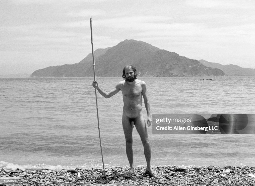 Allen Ginsberg Naked Holding Stick on Beach