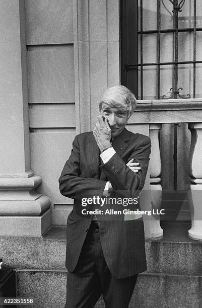 Writer John Updike Posing by Building