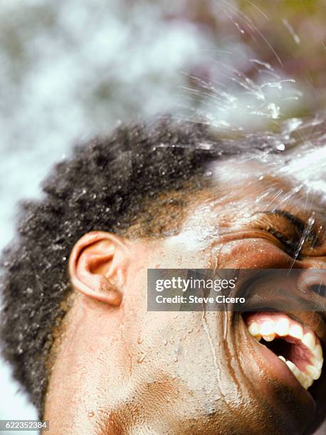 Splashed People 5,497 Splashed Face Stock Photos, High-Res Pictures, and Images - Getty ...