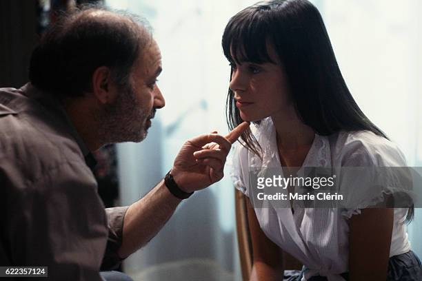 French actor, director, screenwriter and producer Claude Berri and actress Elodie Bouchez, on the set of Stan the Flasher directed by singer,...