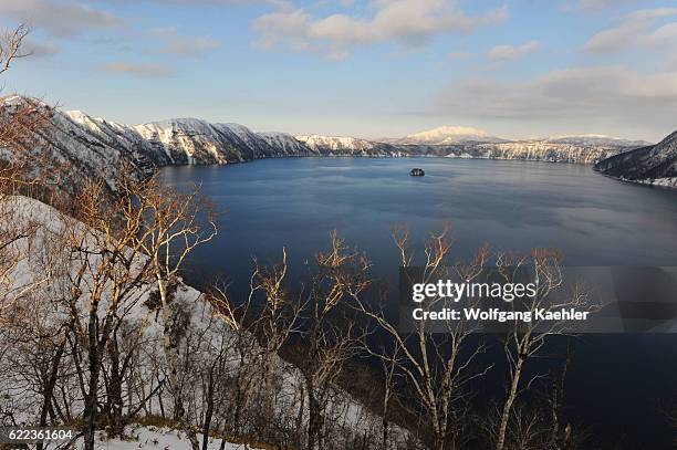 View of Lake Mashu, which is a caldera lake in Akan National Park on Hokkaido Island, Japan, known for one of the clearest lakes in the world.