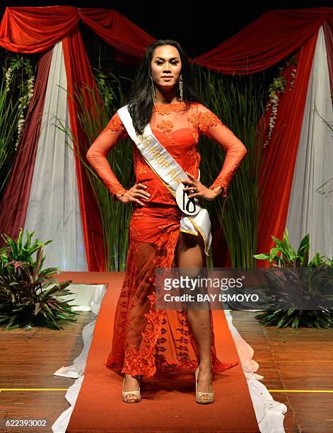 Miss Transvestite Indonesia 2016 contestant poses during the 2016 Miss Queen contest in Jakarta on November 11, 2016. Indonesian transgenders paraded...