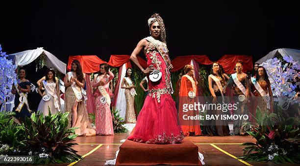 Miss Transvestite Indonesia 2016 contestants perform during the 2016 Miss Queen contest in Jakarta on November 11, 2016. Indonesian transgenders...