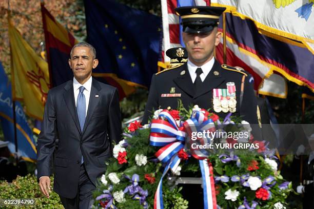 President Barack Obama participates in a wreath-laying ceremony at the Tomb of the Unknown Soldier at Arlington National Cemetery in Arlington,...