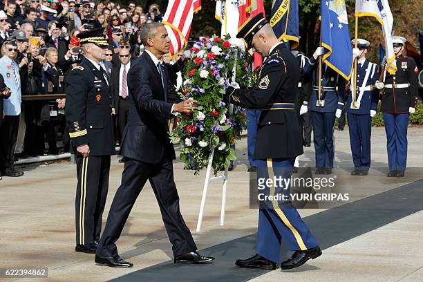 President Barack Obama participates in a wreath-laying ceremony at the Tomb of the Unknown Soldier at Arlington National Cemetery in Arlington,...