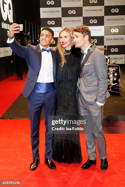 Cliff Goncalo, GQ Gentleman 2016, model Alena Gerber and model Simon Lohmeyer attend the GQ Men of the year Award 2016 at Komische Oper on November...