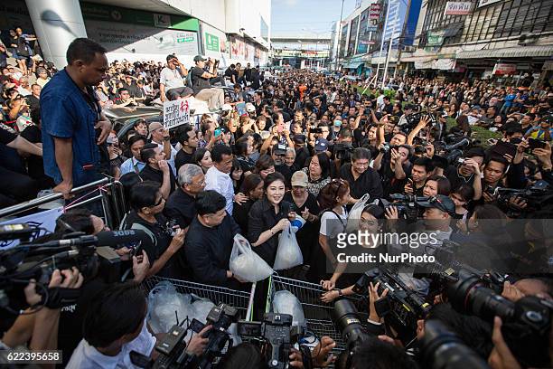 Thailand's Former Prime Minister Yingluck Shinawatra sell rice directly from the farmers outside Emperial Samrong Shopping Mall in Samut Prakan...