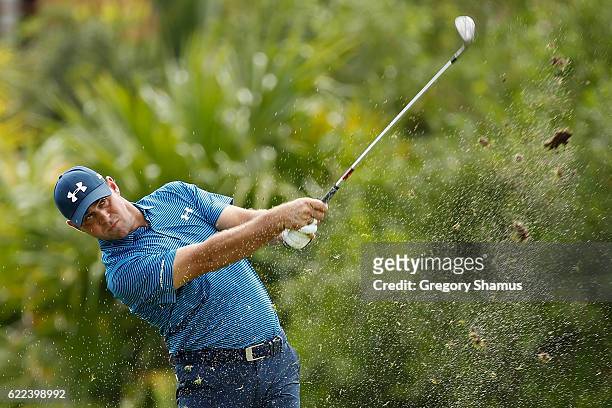 Gary Woodland of the United States plays his shot from the 17th fairway during the second round of the OHL Classic at Mayakoba on November 11, 2016...