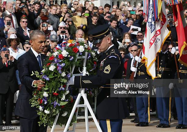 President Barack Obama participates in a wreath-laying ceremony at the Tomb of the Unknown Soldier at Arlington National Cemetery on Veterans Day...